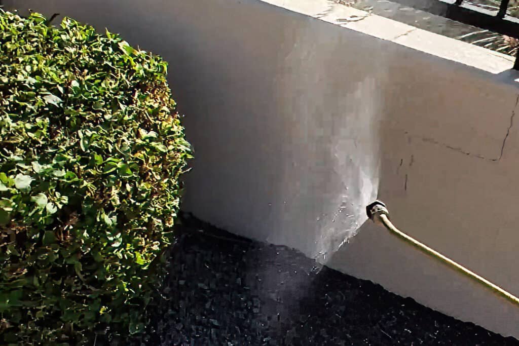 Liquid Pesticide Spraying Base of Wall